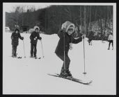 Mary Morgan and children skiing